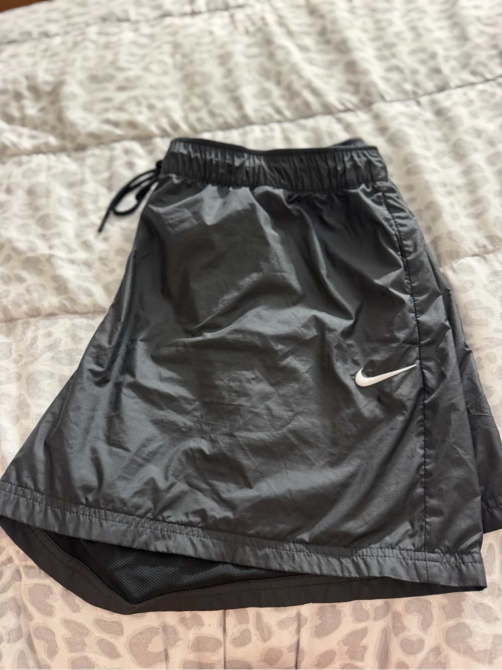 Nike Black Athletic Shorts with White Swoosh Accent